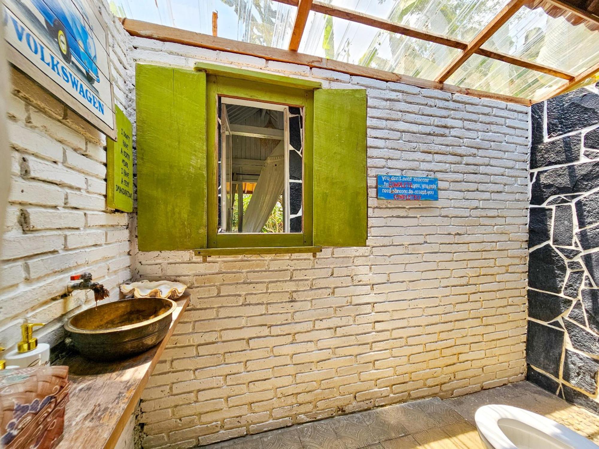 Janur Bungalow Magelang Værelse billede