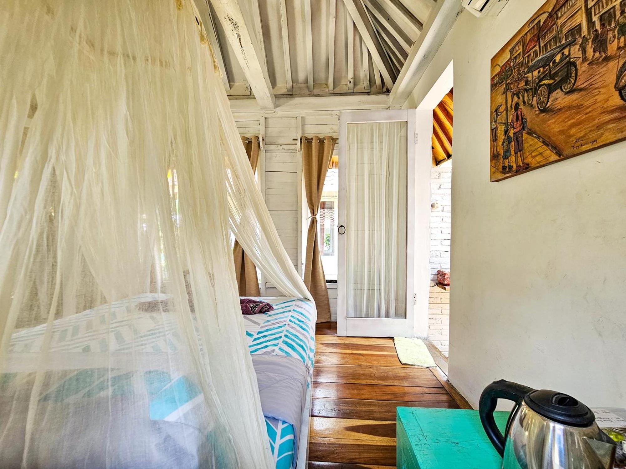 Janur Bungalow Magelang Værelse billede